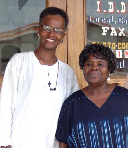 A scholar pictured with Ghanaian playwright Ama Ata Aidoo